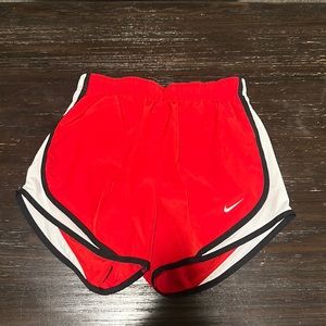 Red Nike shorts